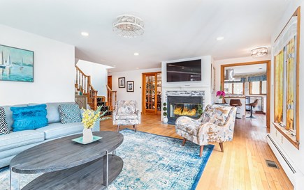 Falmouth Cape Cod vacation rental - Living room with harbor views and deck access