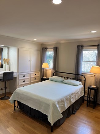 Harwich Cape Cod vacation rental - Bedroom features a queen bed and built-in dressers.