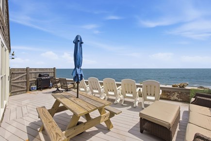 Dennis Port Cape Cod vacation rental - Deck with propane grill, waterview, and picnic table
