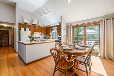 Harwich Cape Cod vacation rental - Open concept dining and kitchen area.