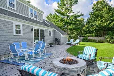 Osterville Cape Cod vacation rental - Outside dining table seats 6, fire-pit seats 4