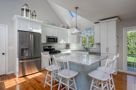 Osterville Cape Cod vacation rental - Kitchen with center island and seating for 4