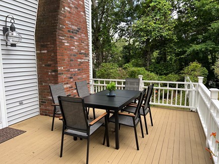Brewster Cape Cod vacation rental - The patio table is expandable to an 8 person table.