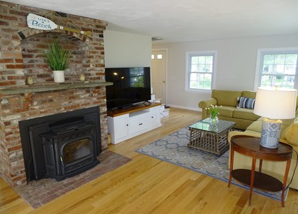 Chatham Cape Cod vacation rental - Living room with TV, pellet stove