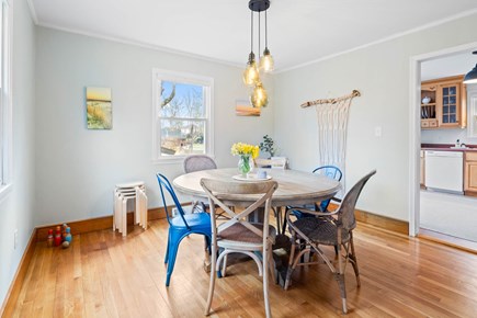 Cotuit Cape Cod vacation rental - Our dining room with a rustic table for family meals.
