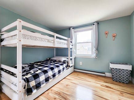 Dennisport Cape Cod vacation rental - Second bedroom with twin bunkbeds and a third twin trundle.