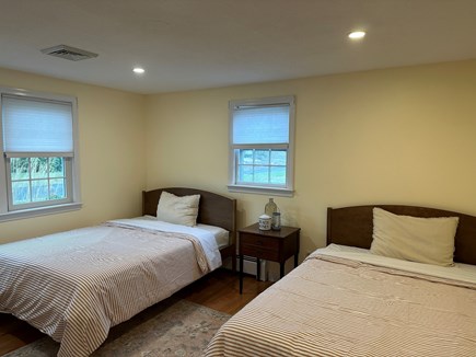 Yarmouth, Honeybee Cottage Cape Cod vacation rental - Two comfy full beds with a dresser and built in closet storage.