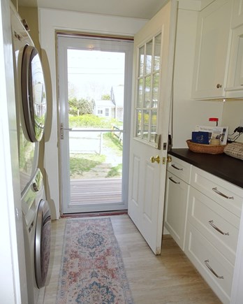 Eastham Cape Cod vacation rental - New entry way with washer/dryer and storage space 