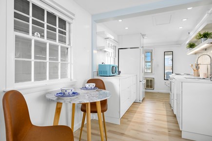 Dennis Cape Cod vacation rental - Eating area looking into the kitchen and secondary sleeping area