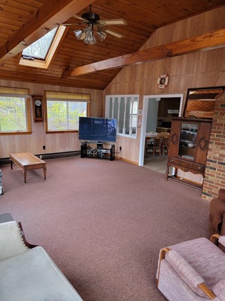 Dennisport Cape Cod vacation rental - Sunroom surrounded by windows and with skylights and ceiling fan