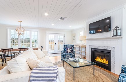 Sandwich Cape Cod vacation rental - Sitting area with TV and fireplace