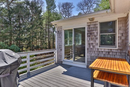 Centerville Cape Cod vacation rental - Porch with Webber Grill and Table With Benches