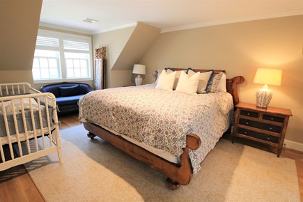 Osterville Cape Cod vacation rental - Queen bedroom above garage with crib and ensuite bathroom