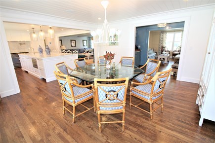 Osterville Cape Cod vacation rental - Dining space with kitchen, family room, and bar in background