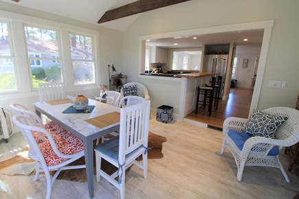 Wellfleet Cape Cod vacation rental - dining space with kitchen beyond