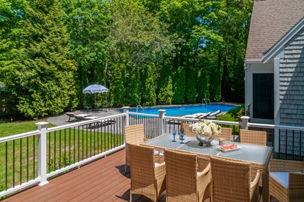Osterville Cape Cod vacation rental - Large deck with comfortable patio furniture and dining table