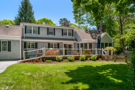 Osterville Cape Cod vacation rental - Back of house featuring oversized deck