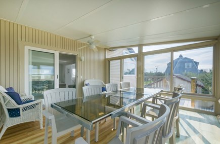 Sagamore Beach Cape Cod vacation rental - Sunroom with dining area for eight guests.
