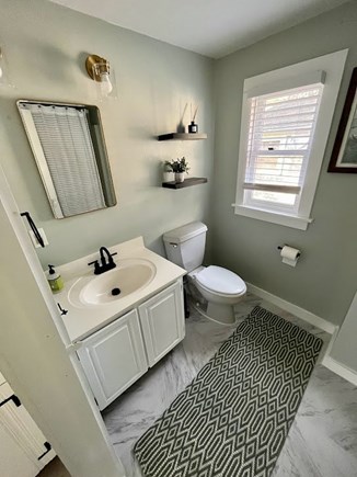 Dennis Port Cape Cod vacation rental - Modern bathroom: bright, with tub & shower.