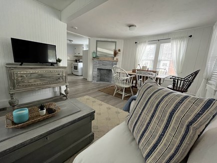 Dennis Port Cape Cod vacation rental - Open-concept home: dining faces kitchen; sitting area on left.