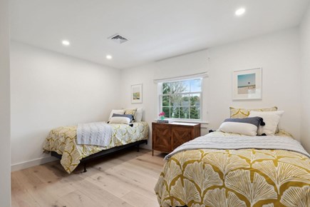 Osterville Cape Cod vacation rental - 2nd floor bedroom with two twin beds overlooking pool.