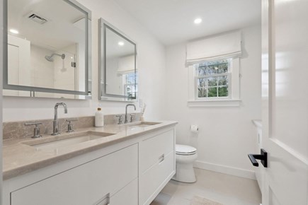 Osterville Cape Cod vacation rental - 2nd floor bathroom w/ shower, lighted mirrors and heated floors.