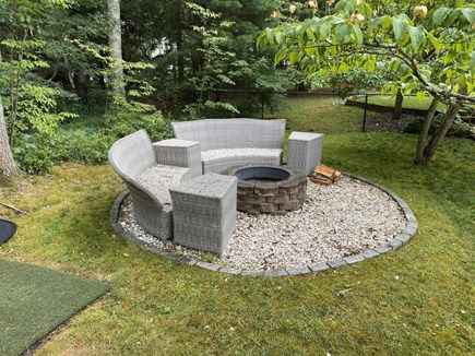 Osterville Cape Cod vacation rental - Relax by the fire pit located off the side porch.