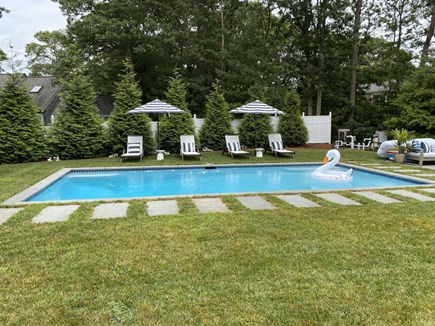 Osterville Cape Cod vacation rental - Heated pool with lights, fountains, lounge chairs, umbrellas