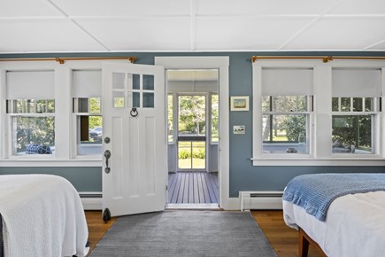 Orleans Cape Cod vacation rental - View of the second bedroom out to bright and airy porch.