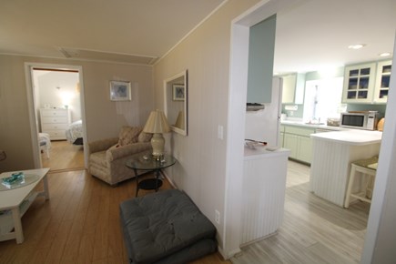 22 Trotters Lane, Dennis Cape Cod vacation rental - family room with kitchen on right