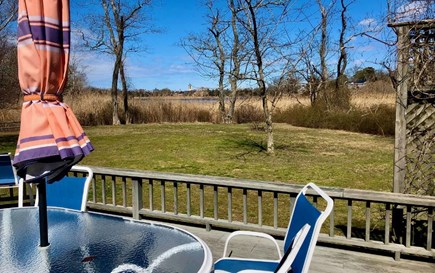Orleans Cape Cod vacation rental - Peaceful yard overlooking salt marsh with table, chairs and grill