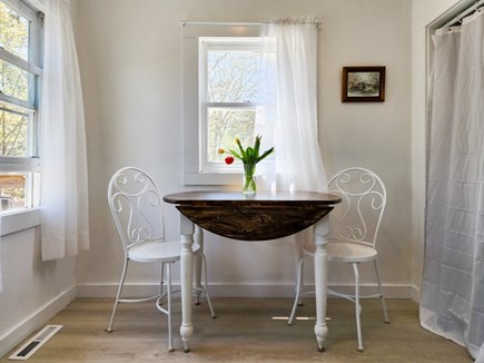 Harwich Cape Cod vacation rental - Dining area in kitchen in rear of home.