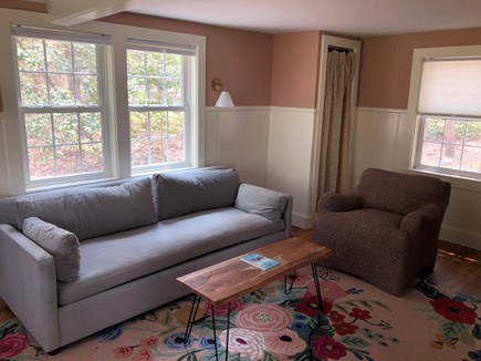 East Sandwich Cape Cod vacation rental - Comfy sofa and view of a forest garden