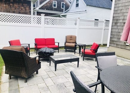 Marshfield, Brant Rock MA vacation rental - Private back yard w/seating area,firepit,dining area, shower