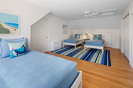 Wellfleet Cape Cod vacation rental - Second upstairs bedroom with three twins and a trundle