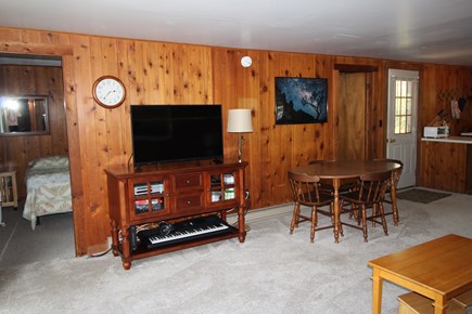 Truro Cape Cod vacation rental - Living Room with TV and Dining