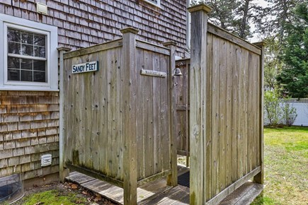 Harwich Cape Cod vacation rental - outdoor shower in the private, fully fenced yard