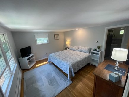 Harwich Cape Cod vacation rental - Bright bedroom with waterfront views and king size bed.