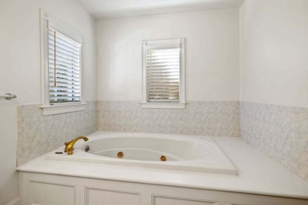 Marstons Mills Cape Cod vacation rental - Bathtub in primary bedroom