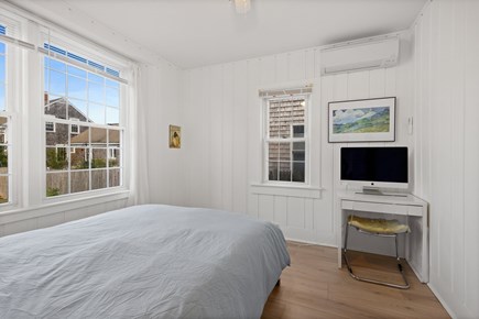 Harwich, Bank Street Beach Cottage Cape Cod vacation rental - Primary bedroom with AC, fresh linens & closet.