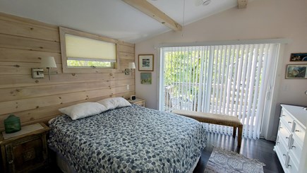 Wellfleet Cape Cod vacation rental - First floor bedroom with queen and slider to front deck