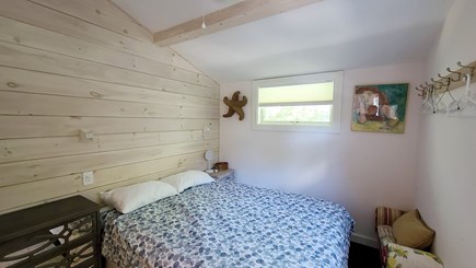 Wellfleet Cape Cod vacation rental - First floor bedroom with queen bed and ensuite half bathroom