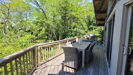 Wellfleet Cape Cod vacation rental - Front deck with dining table and gas grill