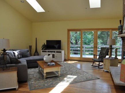 Eastham Cape Cod vacation rental - View of the living room with porch access