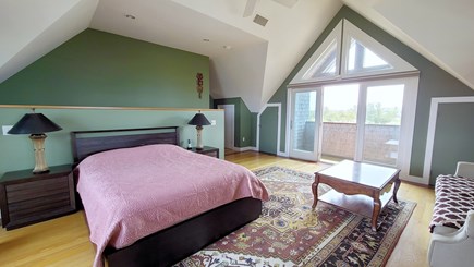 Truro Cape Cod vacation rental - Second floor primary bedroom queen bed and two balconies