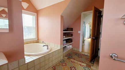 Truro Cape Cod vacation rental - Second floor ensuite bathroom with soaking tub, shower, two sinks