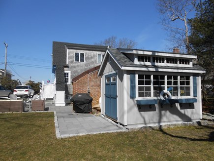 Mashpee Cape Cod vacation rental - View of shed looking toward the patio