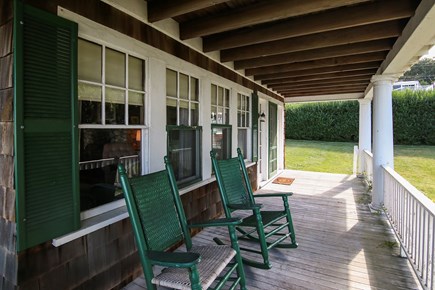 Falmouth Cape Cod vacation rental - Back Porch with 6 Rocking Chairs