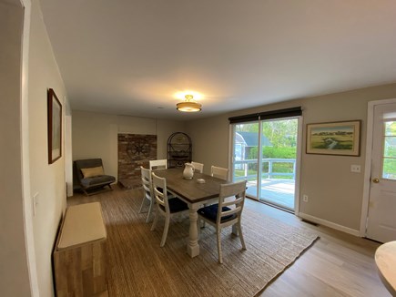 Eastham Cape Cod vacation rental - Dining room with farm table and seating for 6.