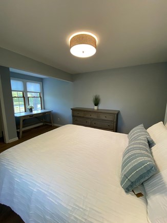 Eastham Cape Cod vacation rental - Another view of Queen bedroom facing desk and windows.